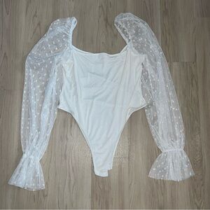 WHITE POLK DOT SLV BODYSUIT